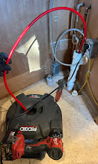 RIDGID drain cleaning machine in use